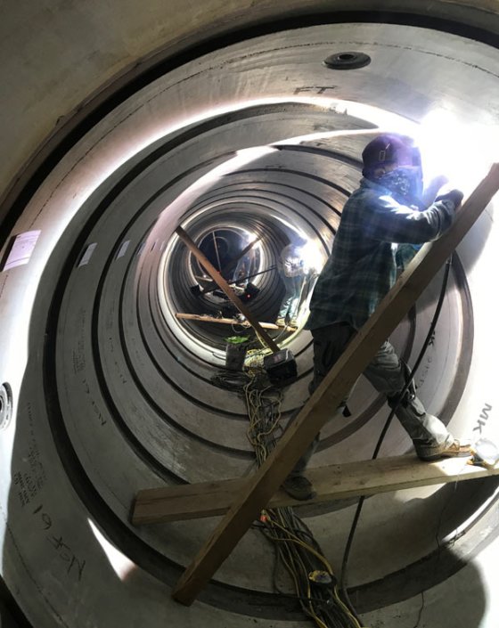 man-inside-pipe
